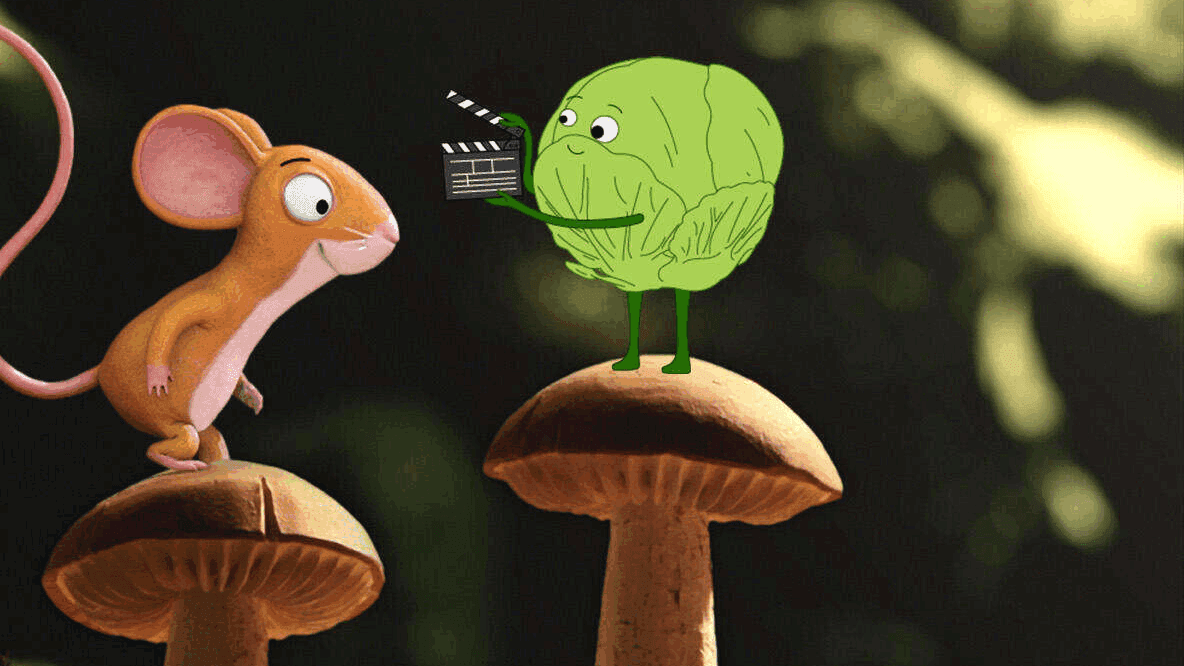 Getekende muis en een spruitje met filmklapper op paddenstoelen